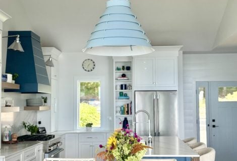 The Surfrider Pendant ties the kitchen design together with its light blue finish, casual elegance, and dimmable glow.