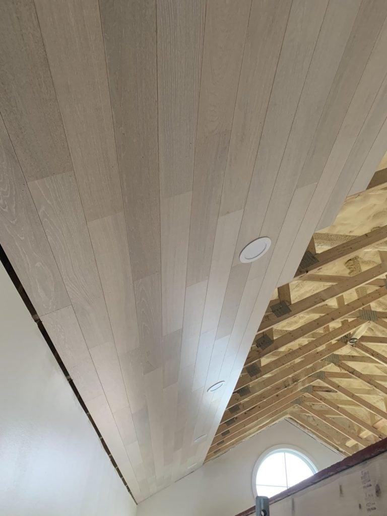 “Close-up of Havwoods International Alabastro HW16404 European Oak planks made in Europe, used for ceiling installation.”
